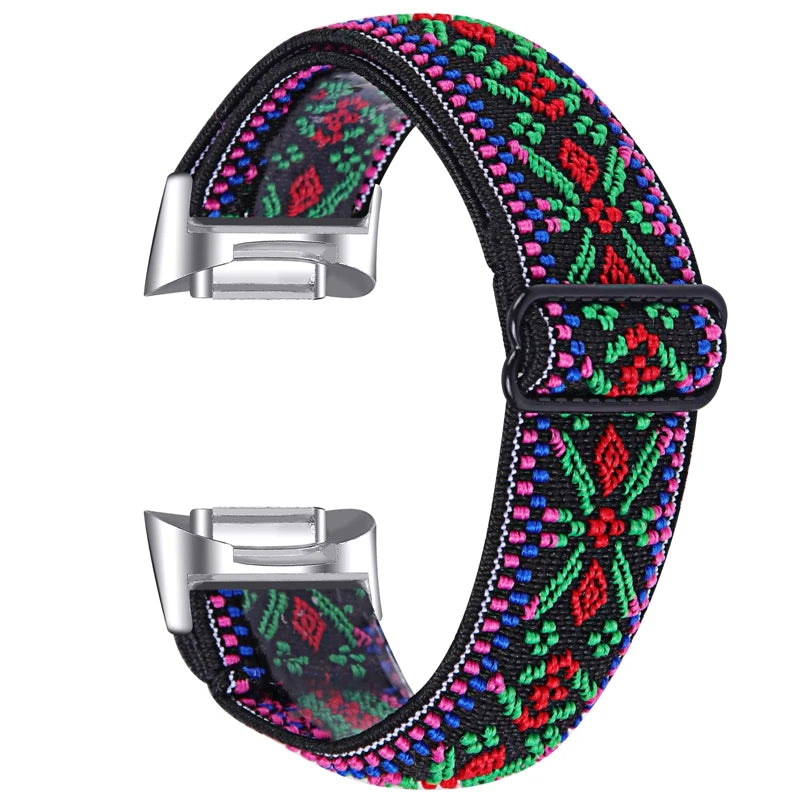 Vibrant Fitbit Charge 6 nylon strap with elastic fabric for smartwatch, featuring colorful floral design, perfect for active lifestyles.