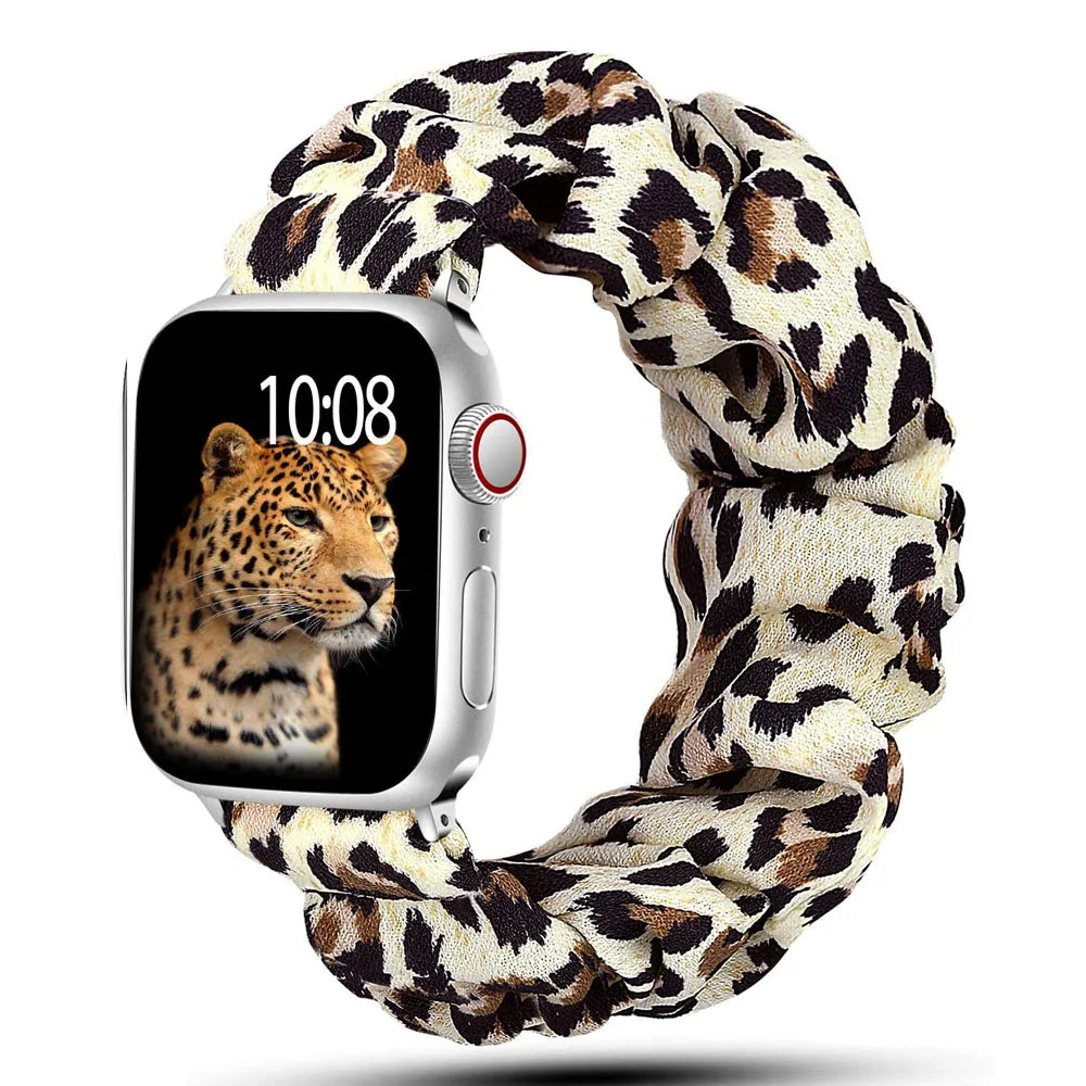 Apple Watch Scrunchie Strap in leopard print, soft elastic nylon loop band for comfort and style.