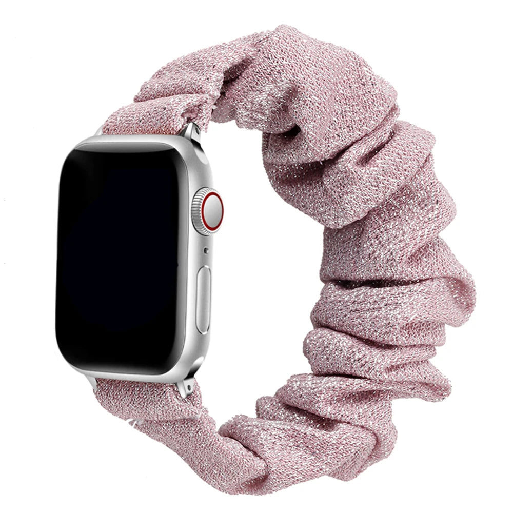 Apple Watch Scrunchie Strap in soft pink elastic nylon for stylish and comfortable smartwatch wear.