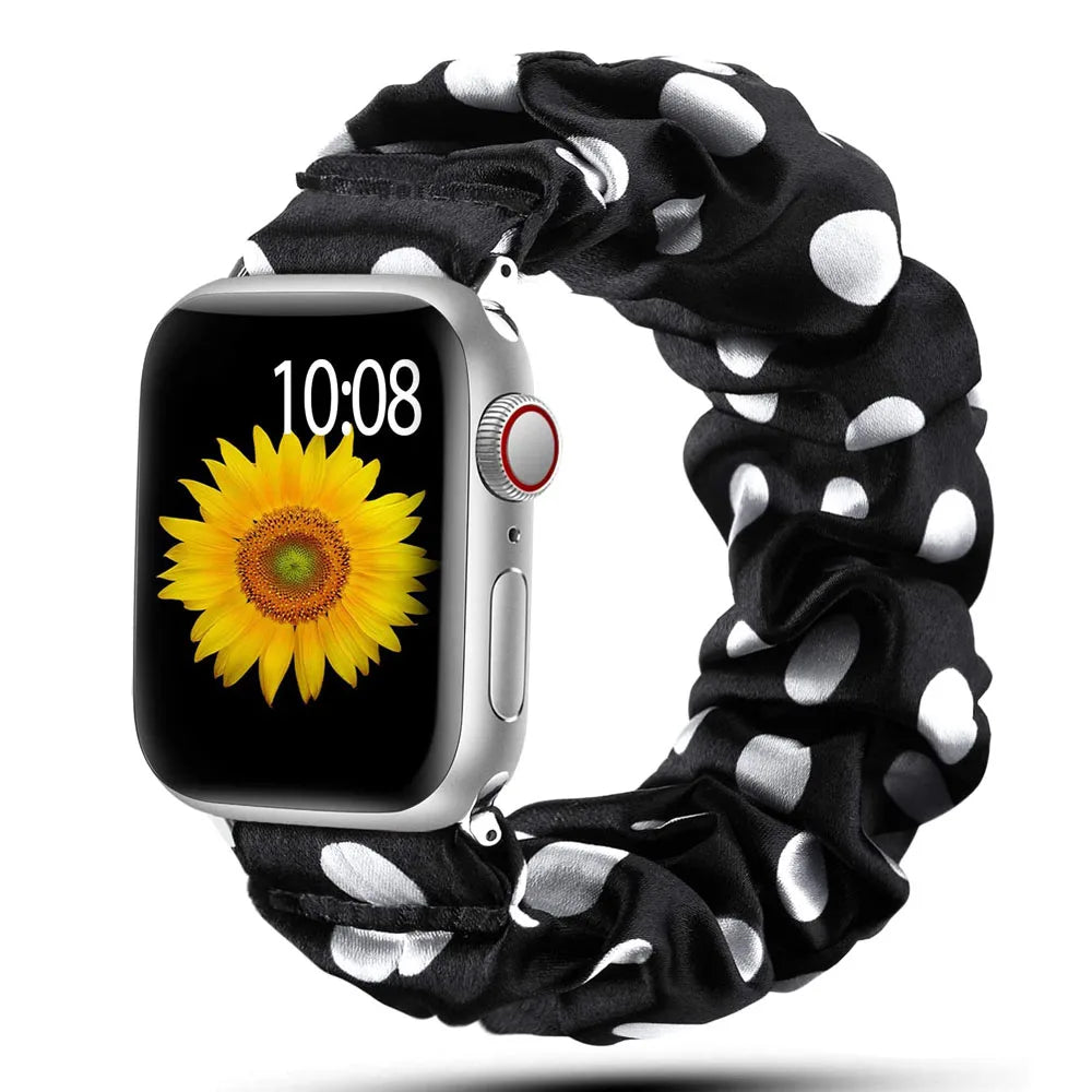 Apple Watch Scrunchie Strap in black with white polka dots, featuring a soft elastic nylon loop for comfort and style.