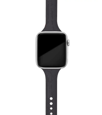 Apple Watch with black silicone band, showcasing a soft and comfortable design for everyday use.