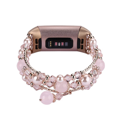 Fashion beaded strap for Fitbit Charge 6, 5, 4, 3; stylish smartwatch band with chic pink jewelry design.