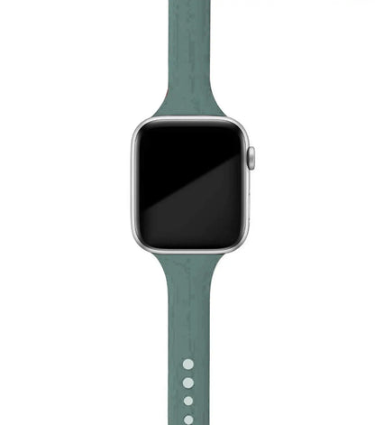 Apple Watch with a soft teal silicone band, designed for comfort and daily wear.
