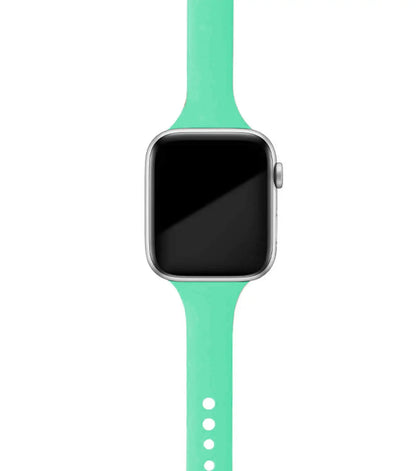 Apple Watch with a mint green silicone band, showcasing comfort and style for everyday wear.