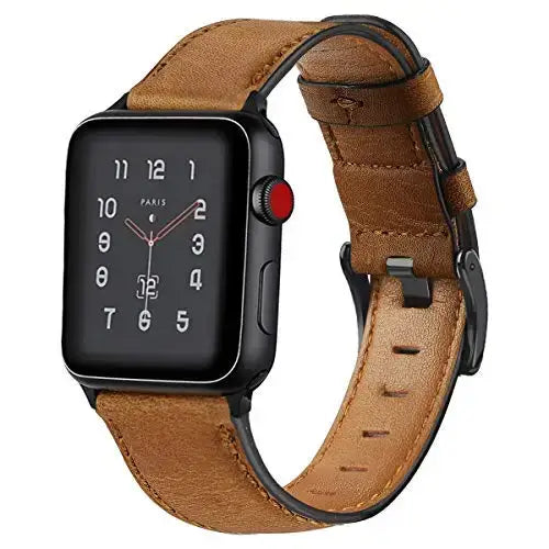 Tan vintage-style leather Apple Watch band with buckle