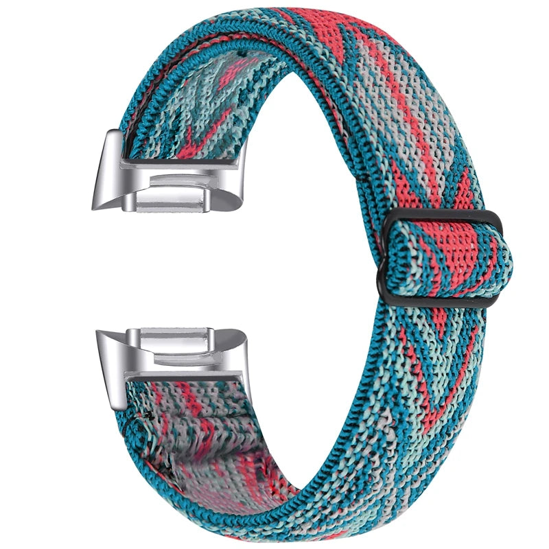 Fitbit Charge 6 nylon strap in vibrant blue and pink design, designed for smartwatch comfort and style.