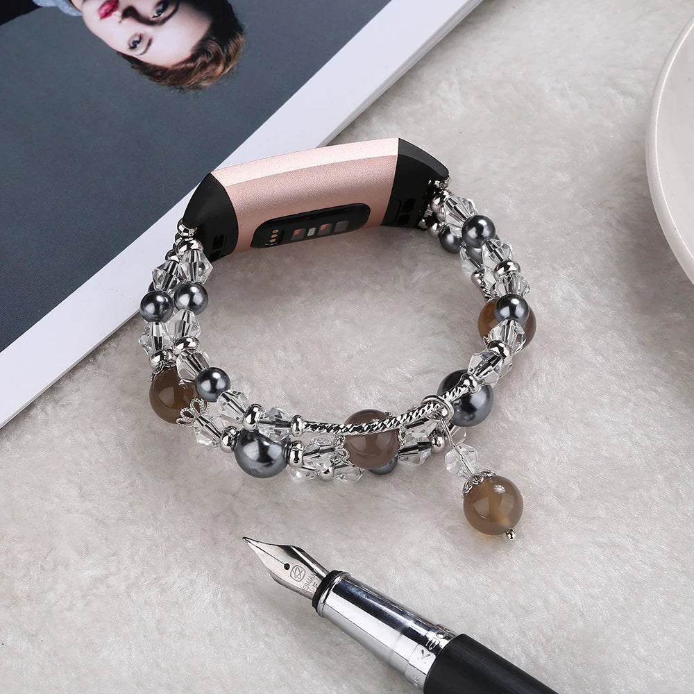 Fashion beaded strap for Fitbit Charge 6, 5, 4, 3, enhancing smartwatch style with Bandsco straps.