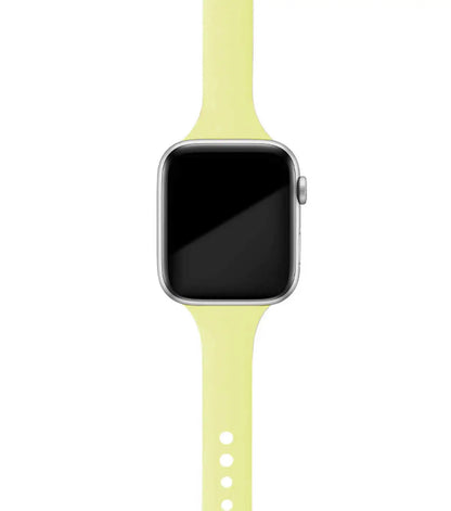Apple Watch with a soft yellow silicone band, designed for comfort and versatility.