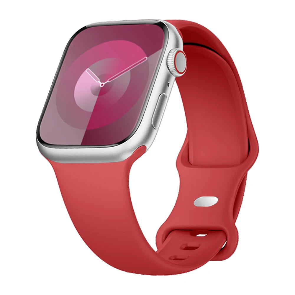 Apple Watch with red silicone strap; soft, flexible, and waterproof for active lifestyles.