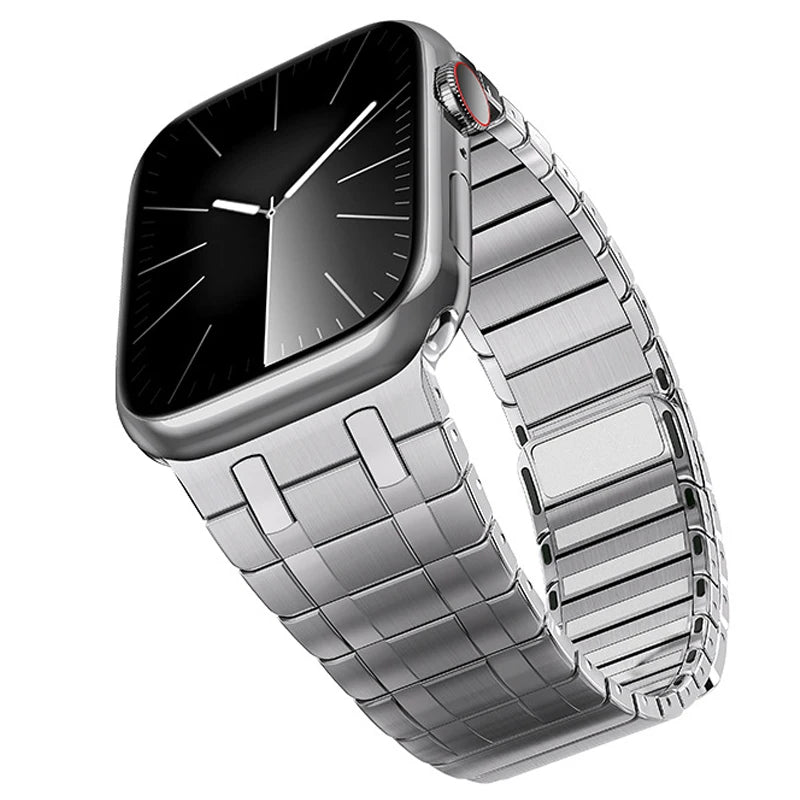Apple Watch with a magnetic stainless steel band in premium titanium color, showcasing its sleek design and modern style.