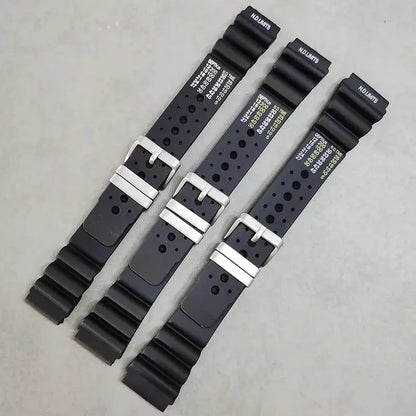 Eco-friendly black silicone Suunto watch bands featuring durable design and adjustable stainless steel buckles.