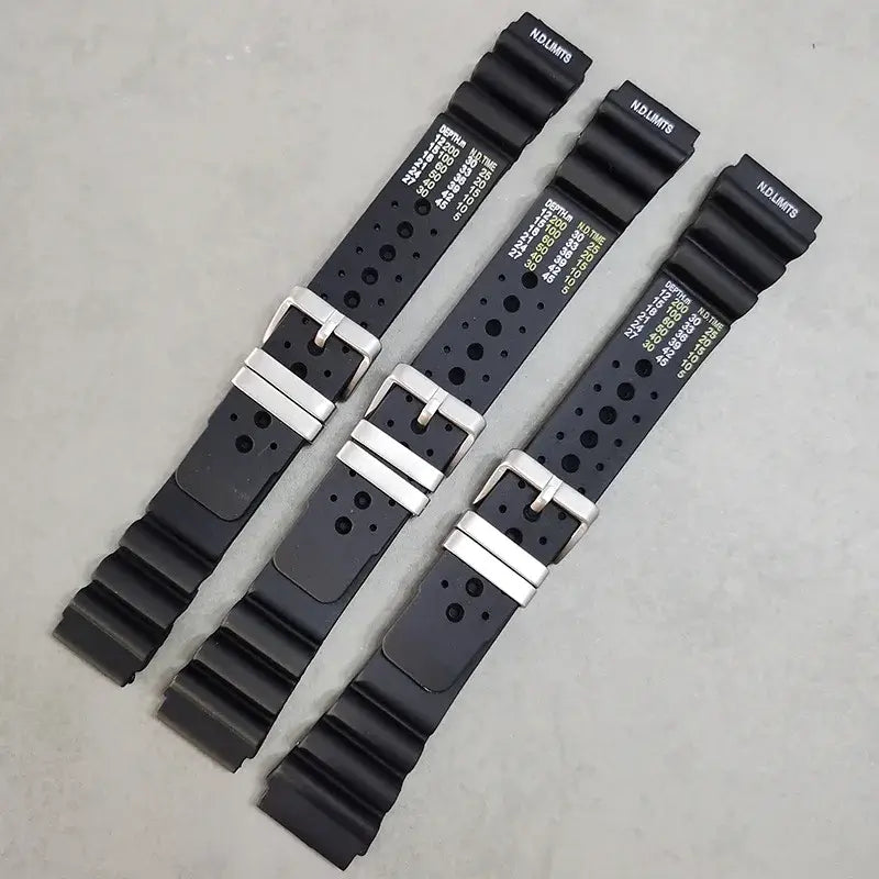 Black silicone dive-style straps with printed markings for compatible Huawei watches