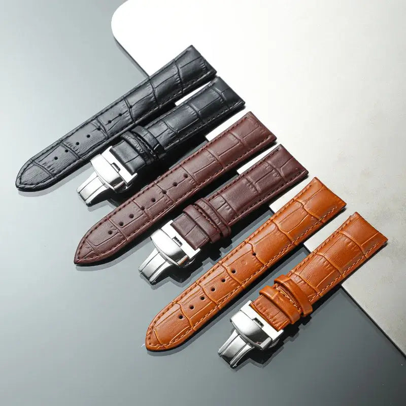 Three embossed leather strap colors with silver-tone clasps