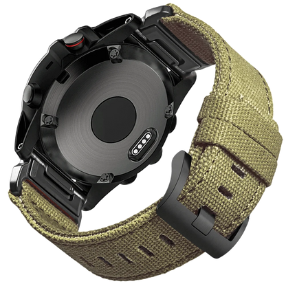Garmin rugged nylon sport band on smartwatch, demonstrating secure G-hook closure and durable woven design.