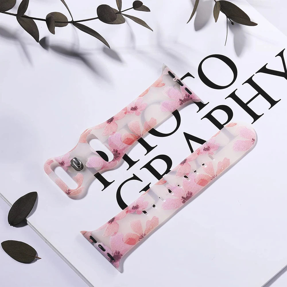 Apple Watch silicone strap with floral design, featuring soft material for comfort and style, ideal for daily wear.