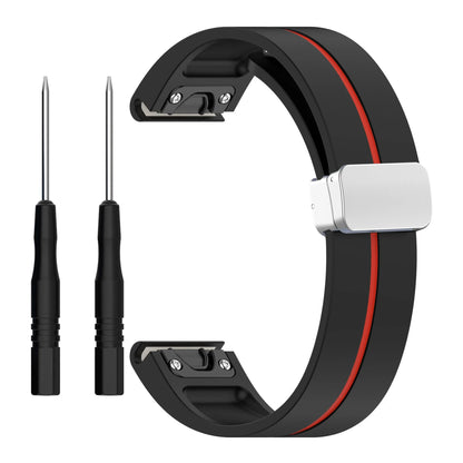 Garmin silicone strap with quickfit feature and two pin tools for smartwatch replacement, offering flexibility and comfort.