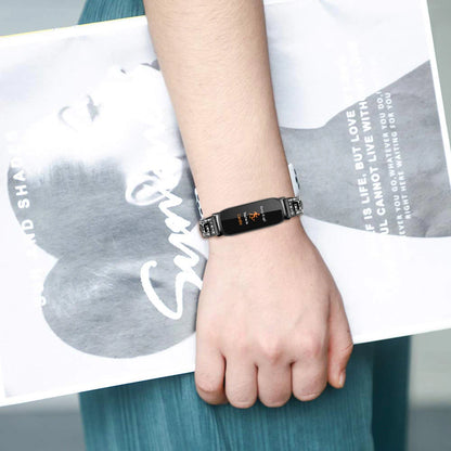 Fitbit Inspire 3 with elegant metal diamond band worn on wrist, showcasing stylish smartwatch accessory and fashionable look.