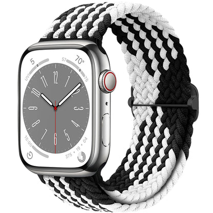 Apple Watch with black and white braided nylon strap offering comfort and style for daily wear.