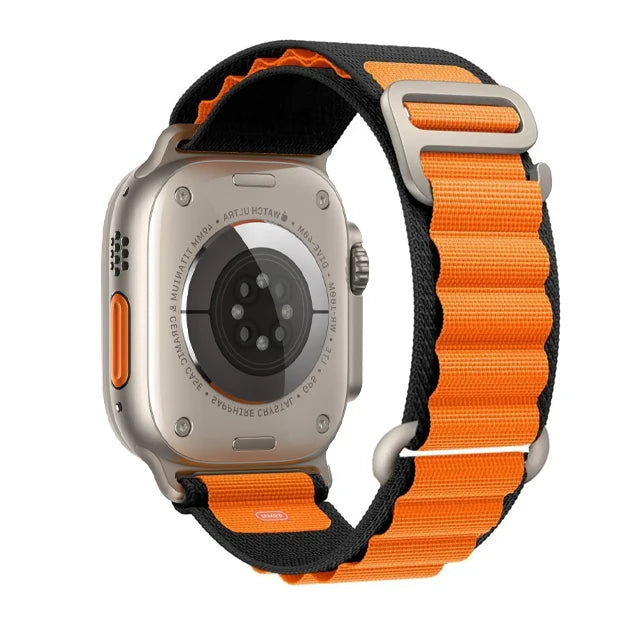 Apple Watch Nylon Strap - Rugged Alpine Loop in orange and black, showcasing adjustable and durable design for outdoor use.
