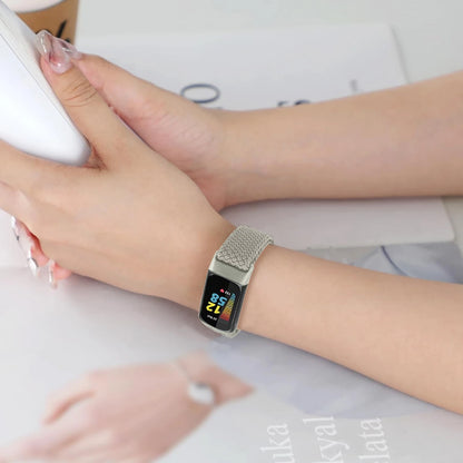 Stylish Fitbit Charge 5 & 6 braided band on wrist, showcasing the comfort and functionality of this smartwatch strap.