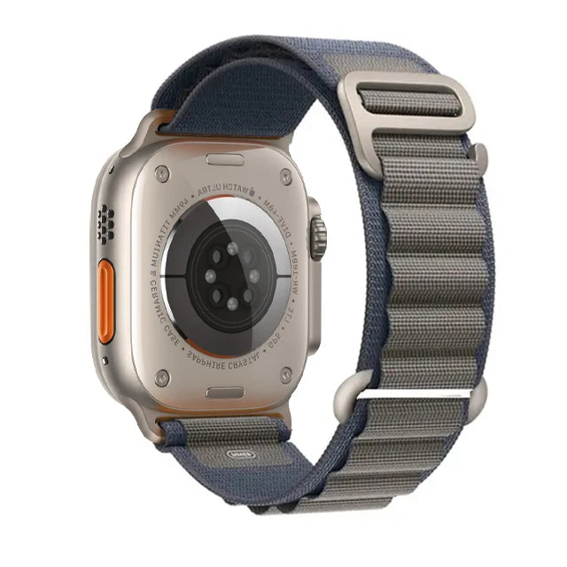 Apple Watch with Rugged Alpine Loop nylon strap, showcasing durability and adjustable design for any wrist size.