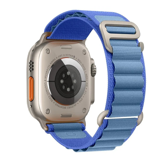 Apple Watch with blue nylon strap, showcasing a durable and stylish design for adventurers and everyday use.