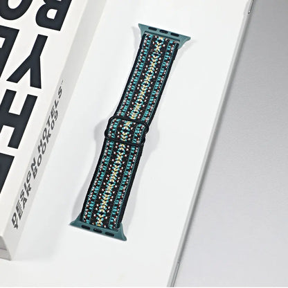 Apple Watch Nylon Sport Loop Strap in teal and black, showcasing breathable design for comfort and style.