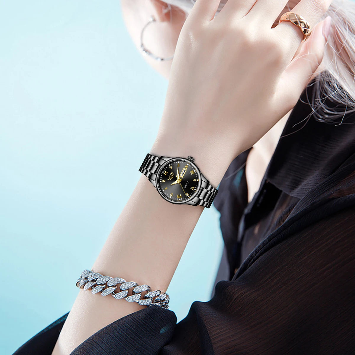 Women's 29mm Day-Date Quartz Bracelet Watch — Black watch worn on wrist