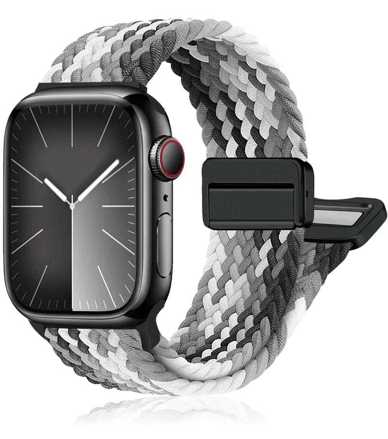 Apple Watch with braided nylon band in black and white, showcasing style, comfort, and durability for all-day wear.