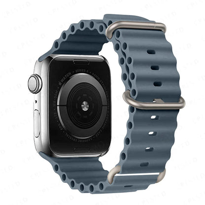Apple Watch with breathable, waterproof silicone strap in blue, ideal for sports and daily wear.