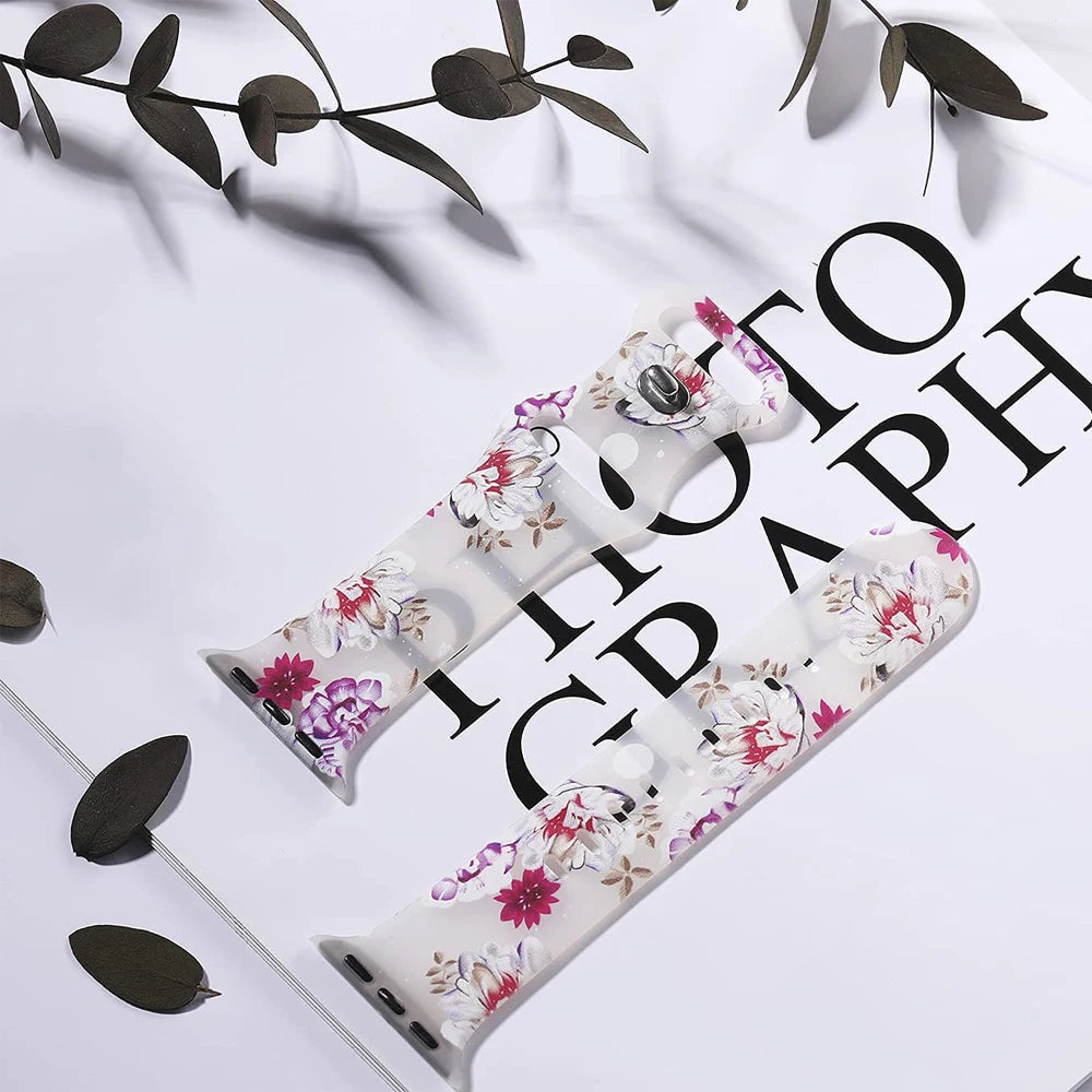 Apple Watch silicone strap with floral design on a stylish background, showcasing comfort and elegance.