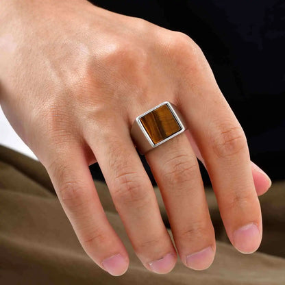 Tiger's eye signet ring worn on hand