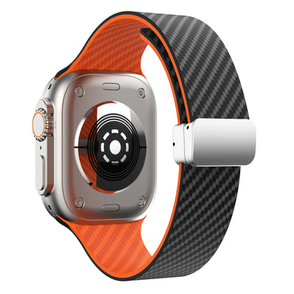 Apple Watch Silicone Strap with magnetic buckle in black and orange, showcasing durable design and secure fit.