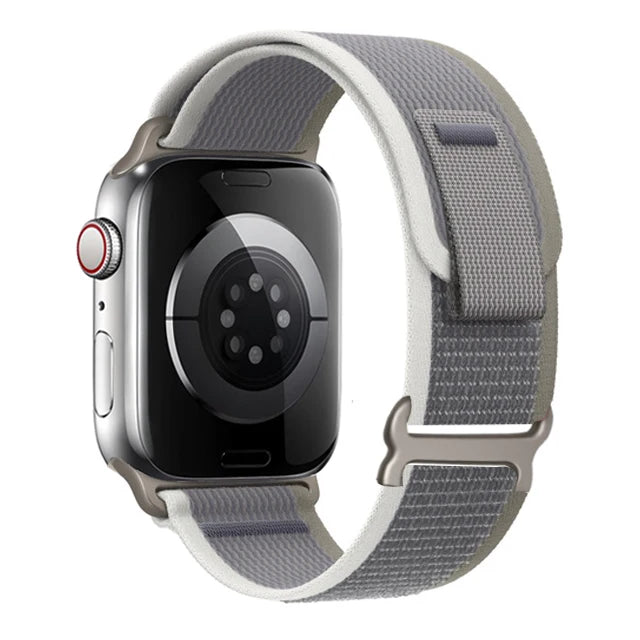 Apple Watch with Trail Loop Nylon Strap in gray, showing durability and comfort for everyday and adventurous wear.