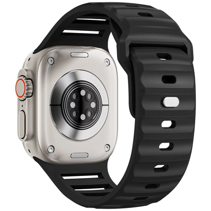 Apple Watch with black silicone sport strap, showcasing a flexible and waterproof design for active lifestyles.