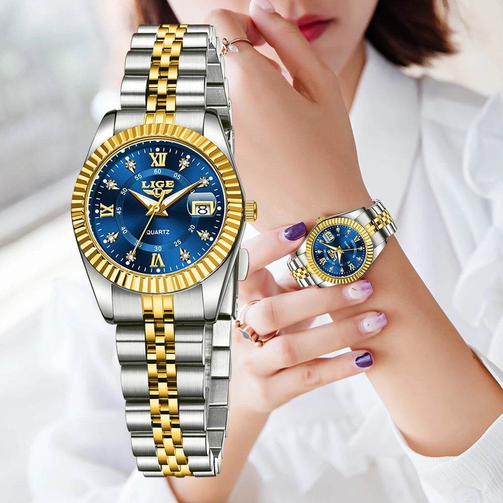 Women's 27mm Fluted Bezel Quartz Date Watch — Blue dial and two-tone bracelet styling