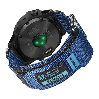 Garmin smartwatch with a blue nylon loop strap, featuring a sweatproof and durable design for active lifestyles.