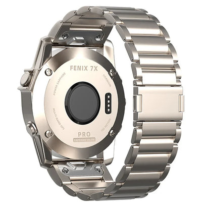 Garmin Fenix 7X smartwatch with a stylish titanium strap, showcasing durability and a secure magnetic closure.