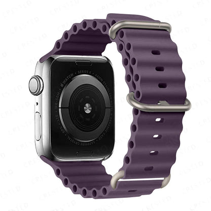 Apple Watch with a waterproof and breathable purple silicone strap, ideal for active lifestyles and workouts.