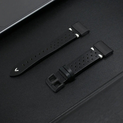 Black silicone Garmin replacement strap for smartwatches, perfect for comfort and durability during workouts.