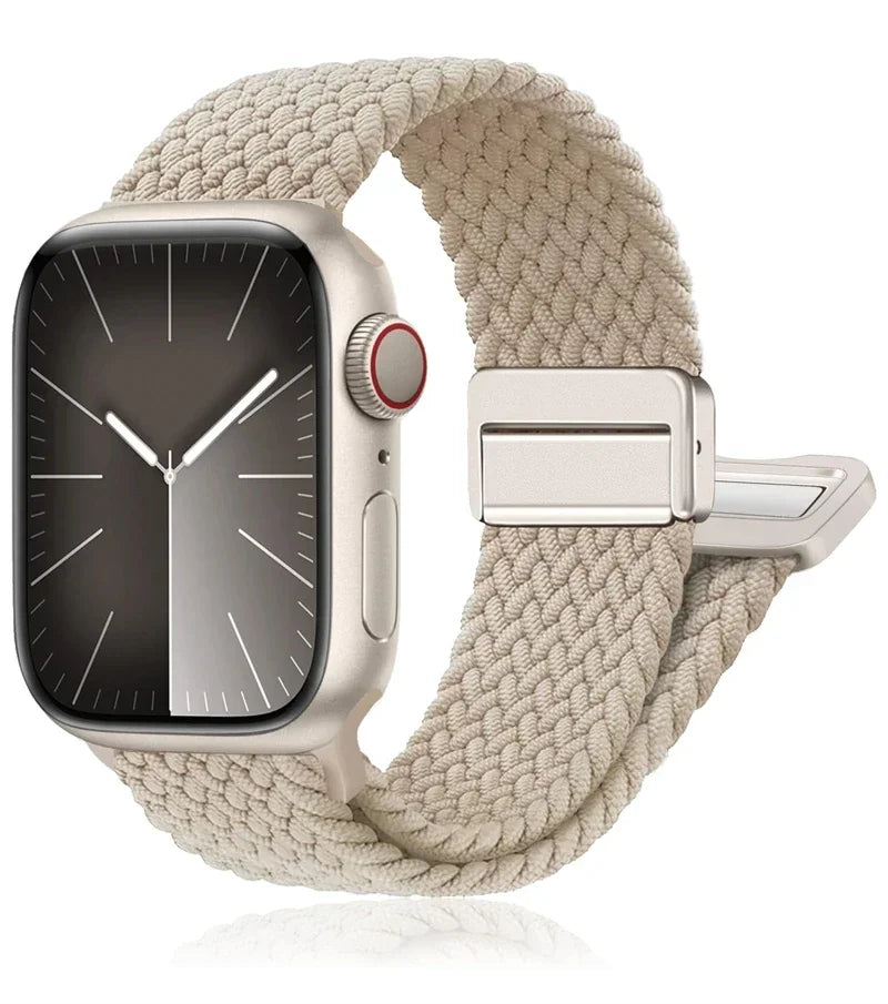 Apple Watch with braided nylon band in beige, featuring a stainless steel buckle for optimal comfort and style.