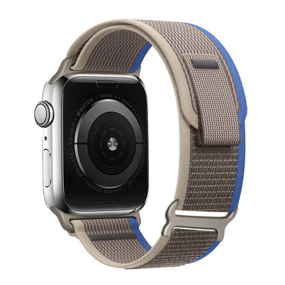 Apple Watch Trail Loop Nylon Strap in gray and blue, showcasing comfort and durability for active lifestyles.