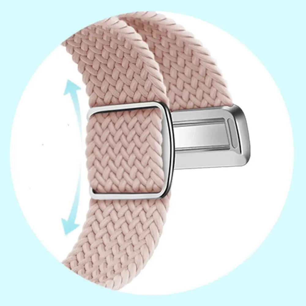 Metal slider adjusting a pink braided nylon strap