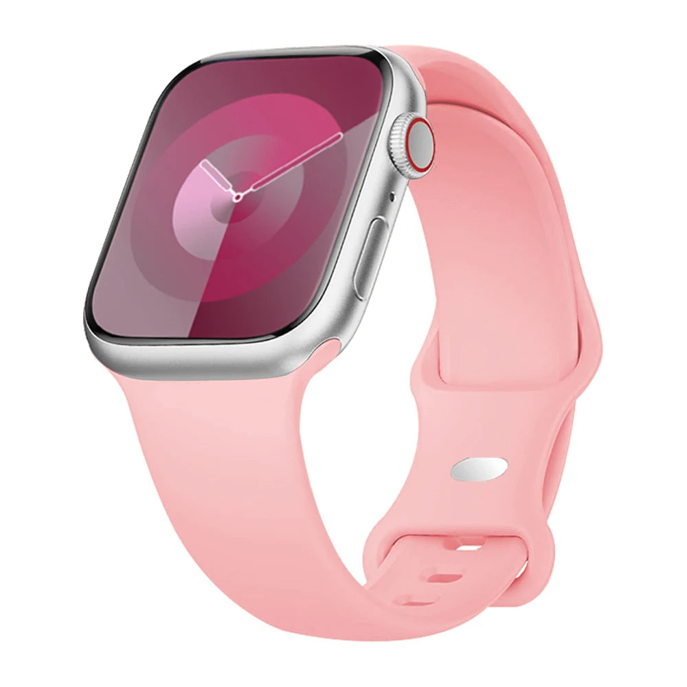 Apple Watch with soft pink silicone strap, featuring a stylish, waterproof band for comfort and active lifestyles.