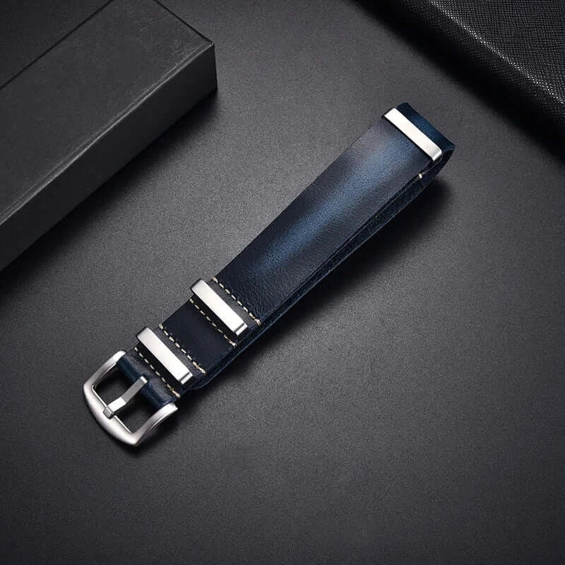 Navy blue leather pass-through strap with silver-tone hardware