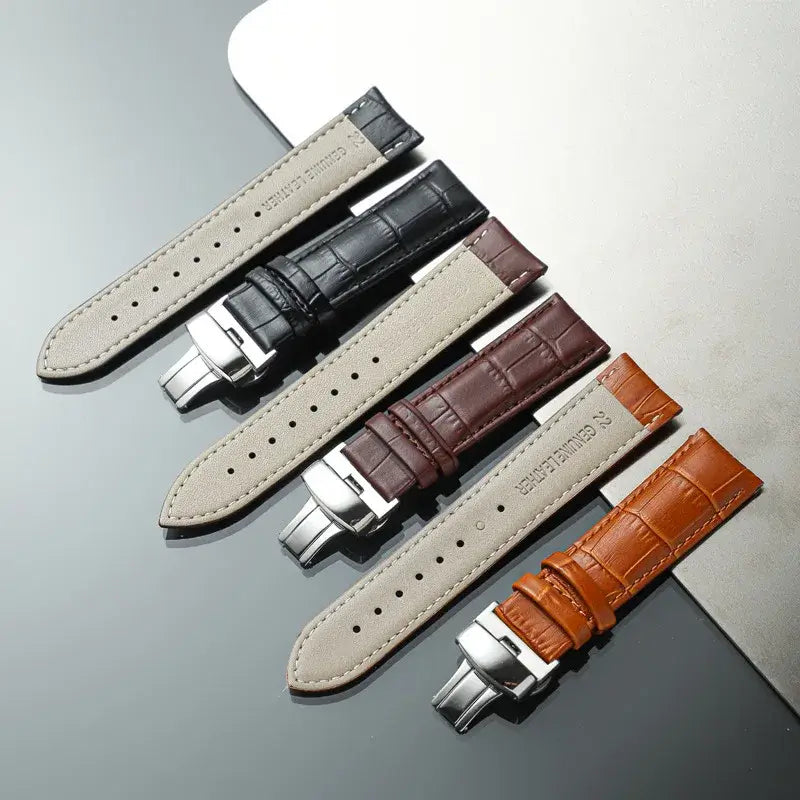 Embossed leather strap front and underside comparison