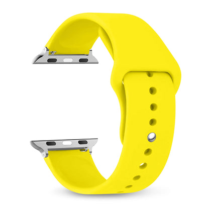 Yellow silicone strap for Apple Watch, comfortable and waterproof, perfect for workouts and daily wear.