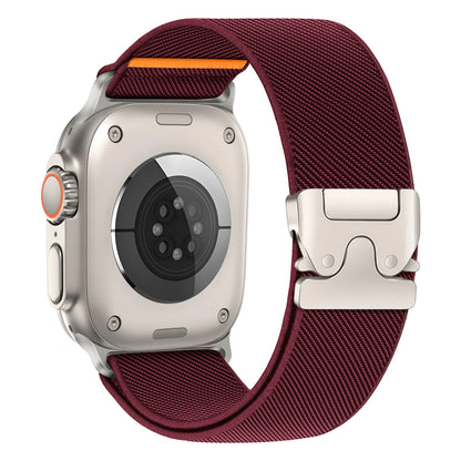 Apple Watch with a burgundy nylon strap featuring a secure buckle for durability and comfort.