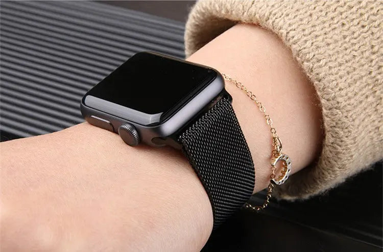 Stylish Apple Watch with premium Milanese stainless steel strap on wrist, showcasing elegance and comfort.