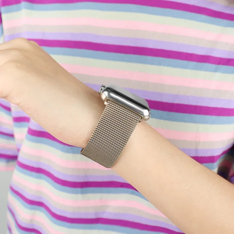 Champagne Milanese mesh Apple Watch band worn on wrist